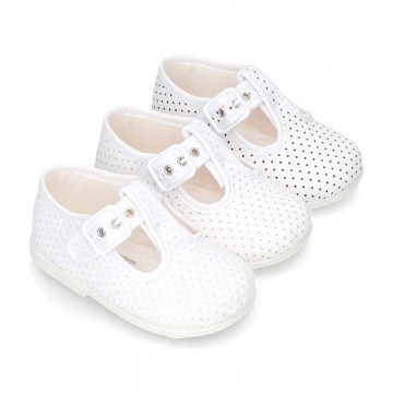 Cotton canvas T-Strap shoes with blue polka dots design.