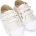 Canvas sneakers with metal finish and toe cap with VELCRO strap closure.