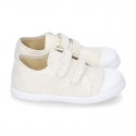 Canvas sneakers with metal finish and toe cap with VELCRO strap closure.