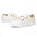 Canvas sneakers with metal finish and toe cap with VELCRO strap closure.