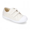 Canvas sneakers with metal finish and toe cap with VELCRO strap closure.