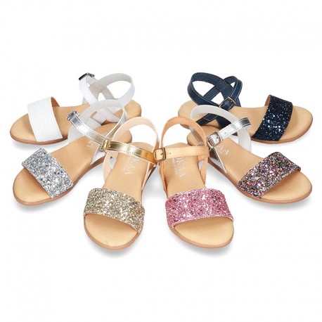 Leather sandal shoes with GLITTER finishes and buckle fastening.