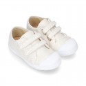 Canvas sneakers with metal finish and toe cap with VELCRO strap closure.