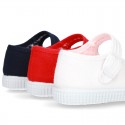 Cotton Canvas Little Mary Jane shoes with buckle fastening and clip and sneaker type sole.