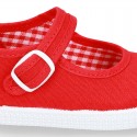 Cotton Canvas Little Mary Jane shoes with buckle fastening and clip and sneaker type sole.