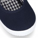 Cotton Canvas Little Mary Jane shoes with buckle fastening and clip and sneaker type sole.