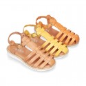 Cowhide leather sandal shoes caged type design with white soles.