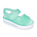 Jelly shoes sandal style with velcro strap and tenis sole design.