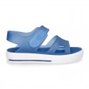 Jelly shoes sandal style with velcro strap and tenis sole design.