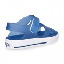 Jelly shoes sandal style with velcro strap and tenis sole design.