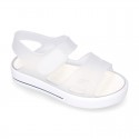 Jelly shoes sandal style with velcro strap and tenis sole design.