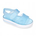 Jelly shoes sandal style with velcro strap and tenis sole design.