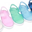 Jelly shoes sandal style with velcro strap and tenis sole design.