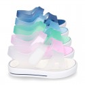 Jelly shoes sandal style with velcro strap and tenis sole design.