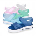 Jelly shoes sandal style with velcro strap and tenis sole design.