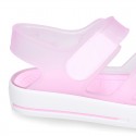 Jelly shoes sandal style with velcro strap and tenis sole design.