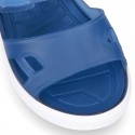 Jelly shoes sandal style with velcro strap and tenis sole design.