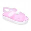 Jelly shoes sandal style with velcro strap and tenis sole design.