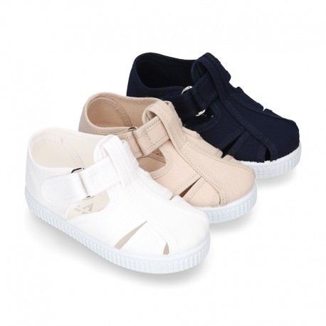 New Cotton Canvas T-strap shoes Sandal style with VELCRO strap closure.