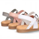 Leather sandal shoes to dress with two rear straps and chopped design for girls.