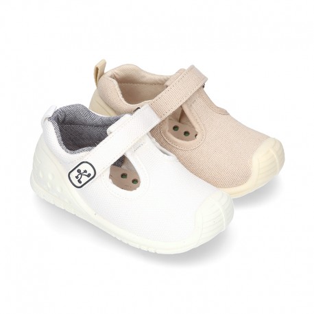 New Cotton canvas little T-Strap shoes with velcro strap design and reinforced toe cap and counter for first steps.