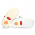 New Cotton canvas little T-Strap shoes with velcro strap design and reinforced toe cap and counter for first steps.