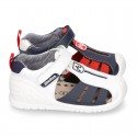 New Washable leather Tennis shoes Sandal style with velcro strap with reinforced toe cap and counter for first steps.