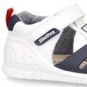 New Washable leather Tennis shoes Sandal style with velcro strap with reinforced toe cap and counter for first steps.