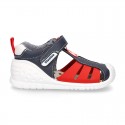 New Washable leather Tennis shoes Sandal style with velcro strap with reinforced toe cap and counter for first steps.