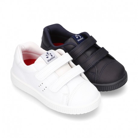 Zapatillas de niños de cole sin cordones y puntera reforzada en piel lavable