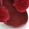 Booties with shoelaces closure with POMPONS in suede leather for kids.