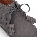 Fringed design Booties with shoelaces closure with TASSELS in suede leather for kids.