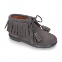 Fringed design Booties with shoelaces closure with TASSELS in suede leather for kids.