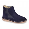 New suede leather ankle boots with WAVES elastic band and zipper closure.