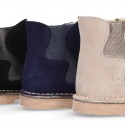 New suede leather ankle boots with WAVES elastic band and zipper closure.