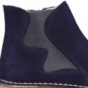 New suede leather ankle boots with WAVES elastic band and zipper closure.