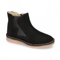 New suede leather ankle boots with WAVES elastic band and zipper closure.