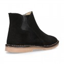 New suede leather ankle boots with WAVES elastic band and zipper closure.