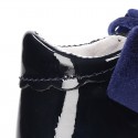 Classic Mary Jane shoes angel style for baby in patent leather with VELVET ties.