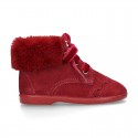 Classic suede leather little bootie with FAKE HAIR neck design.