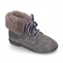 Classic suede leather little bootie with FAKE HAIR neck design.