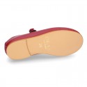 Nappa leather classic Mary Jane shoes with velcro strap and button in fall colors.
