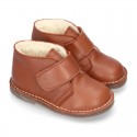 EXTRA SOFT Nappa leather Safari boots with velcro strap and fake hair lining.