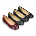 Classic satin leather ballet shoes with english perforated design.