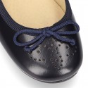 Classic satin leather ballet shoes with english perforated design.