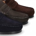Suede leather Classic Moccasins for toddler boys with thick outsole and detail mask.
