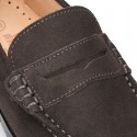 Suede leather Classic Moccasins for toddler boys with thick outsole and detail mask.