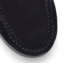 Suede leather Classic Moccasins for toddler boys with thick outsole and detail mask.