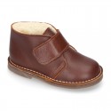 Nappa leather Safari boots with velcro strap and fake hair lining in COWHIDE color.