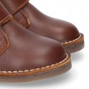 Nappa leather Safari boots with velcro strap and fake hair lining in COWHIDE color.